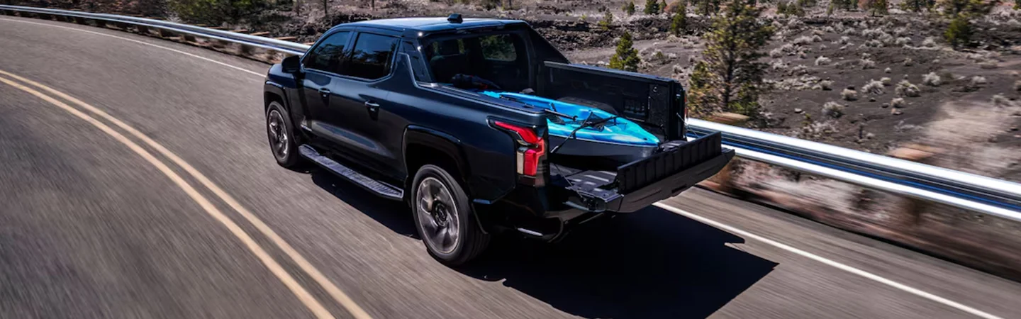 2024 Chevrolet Silverado EV blue side view