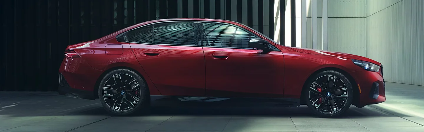2024 BMW i5 Specs  red sideview