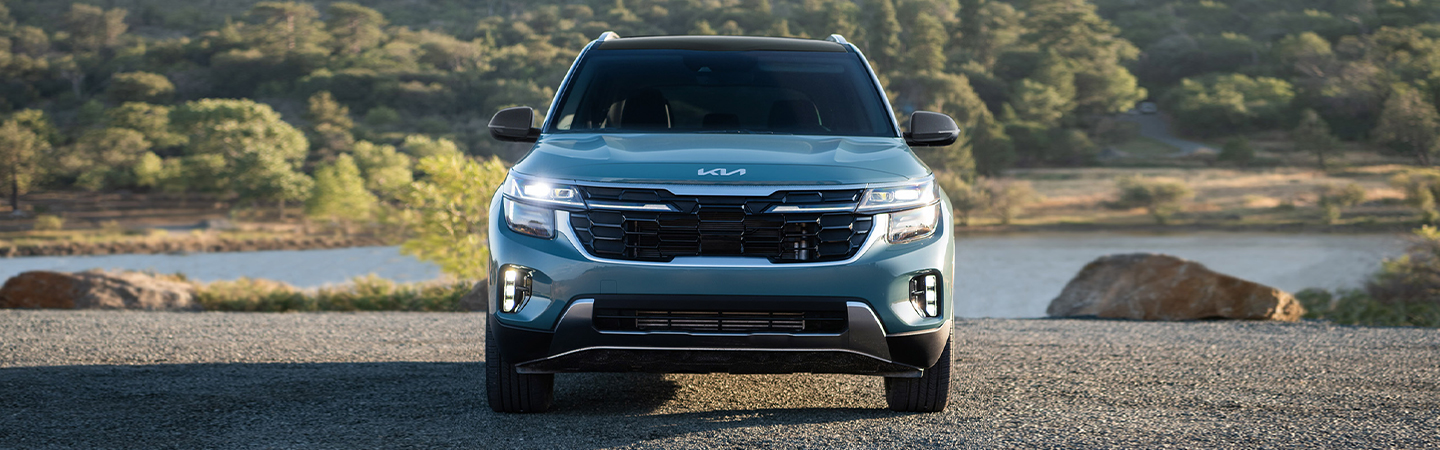 2024 Kia Seltos vs 2024 Toyota RAV4 front green