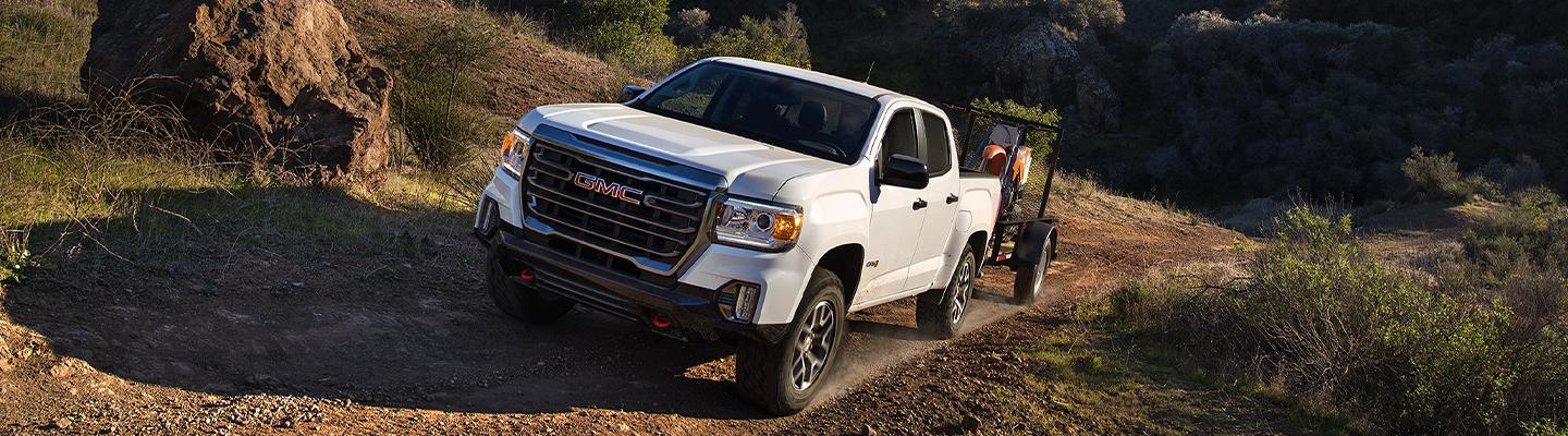 2022 GMC Canyon driving on dirt road