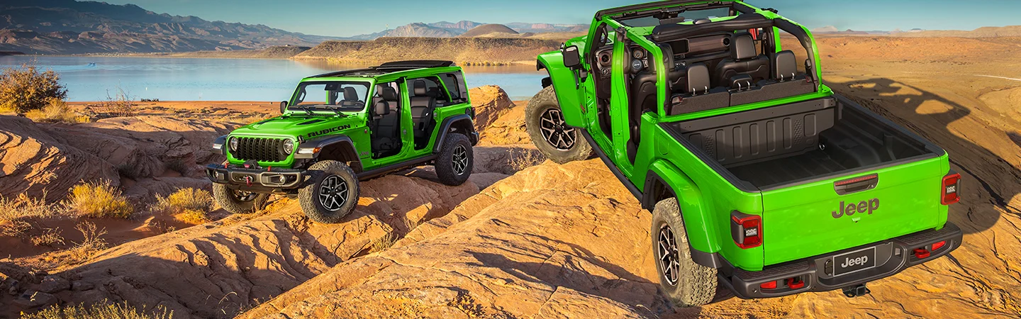 2 neon green Jeep vehicles on hills