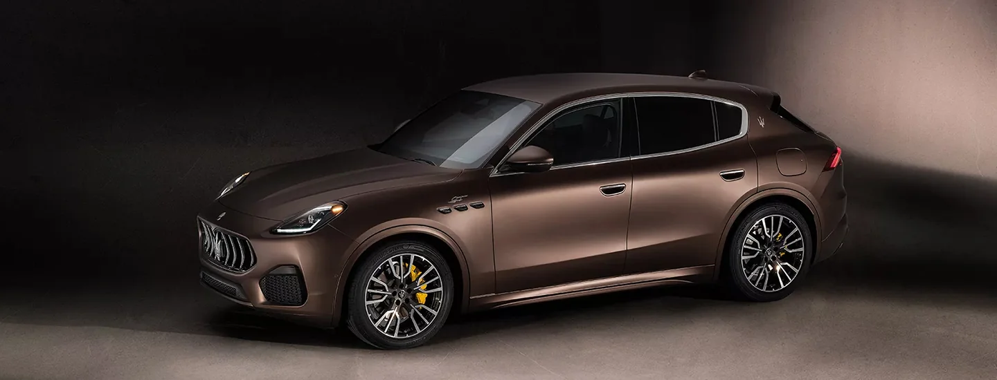 Maserati Grecale parked in a dark room
