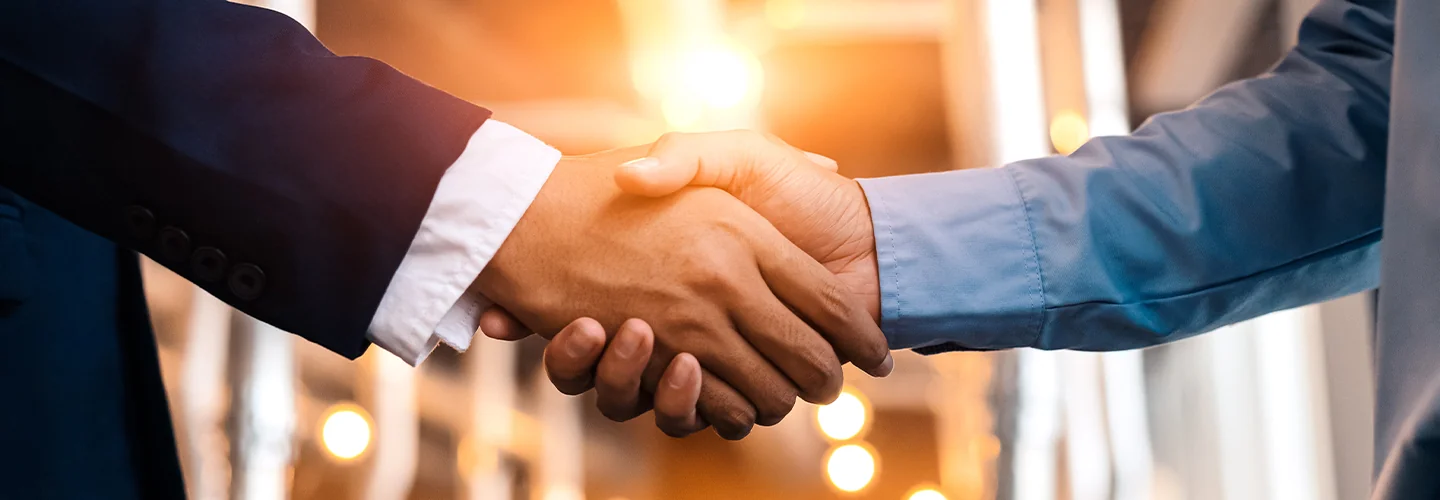 two people shaking hands