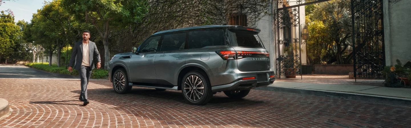 2025 INFINITI QX80 Specs side back in green