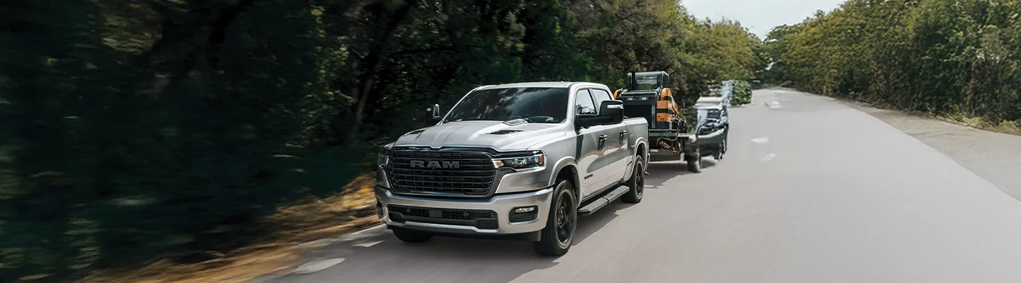 RAM 1500 towing trailer with utility equipment on it