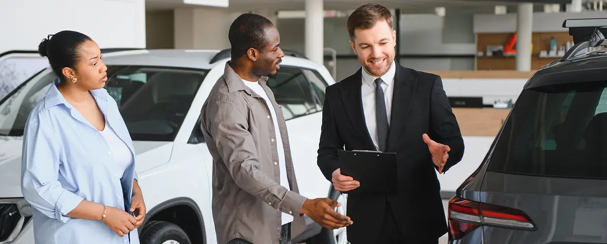 people car shopping in showroom