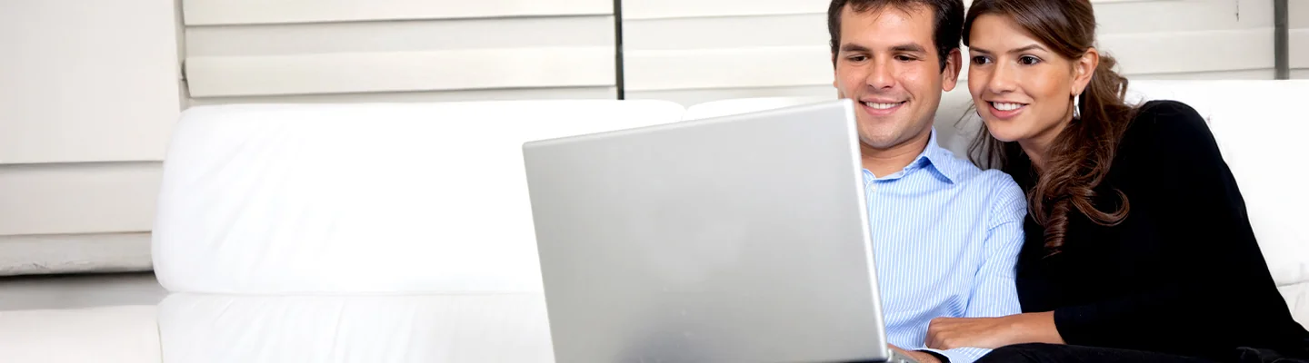 People looking at the Villages Subaru website