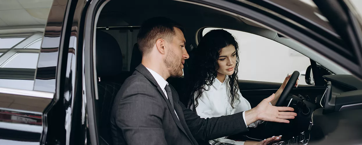 agent showing new car features