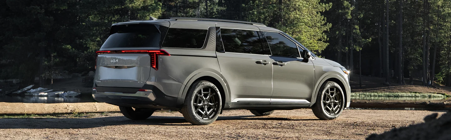 2025 Kia Carnival MPV Hybrid side back in silver 