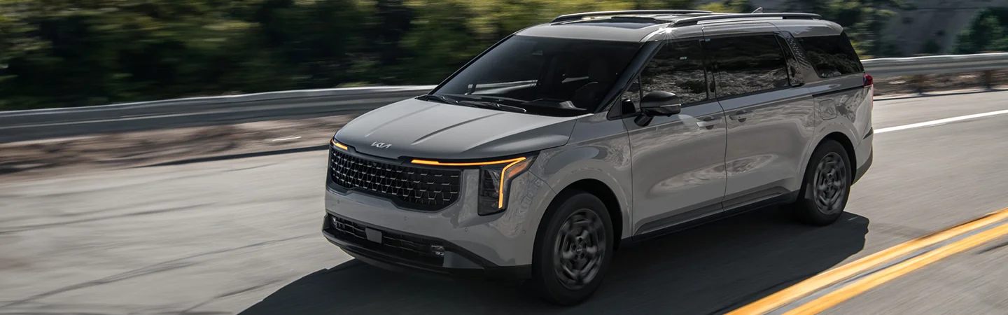 2025 Kia Carnival MPV Hybrid front side in silver 