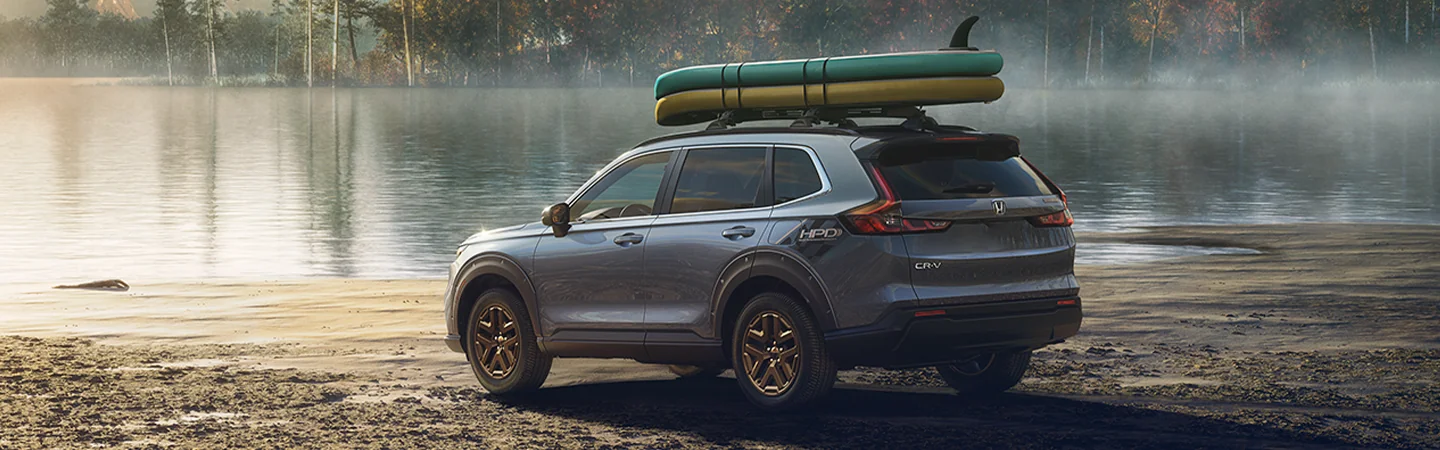 2025 Honda CR-V at th elake with sups on top