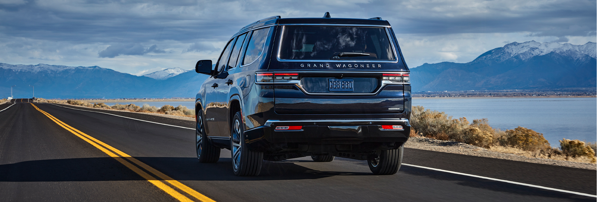 Rear view of 2022 Grand Wagoneer on the road