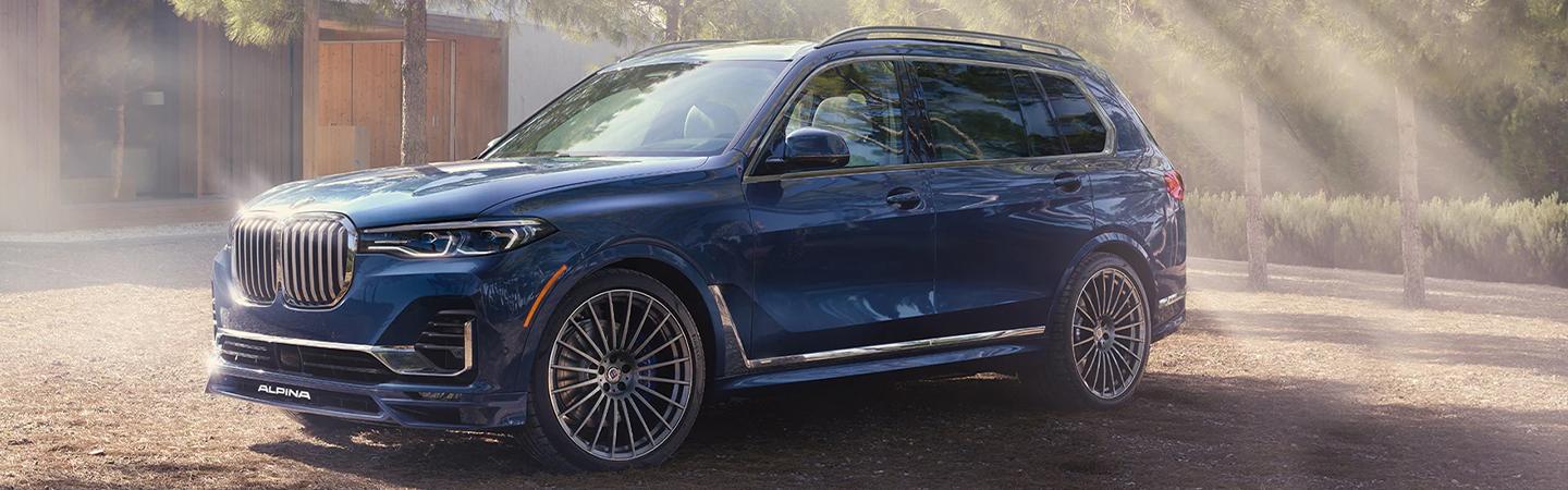 2022 BMW SUV driving on road