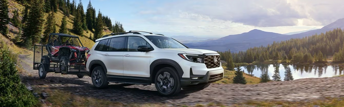 VW Atlas Cross Sport vs Honda Passport white frontview