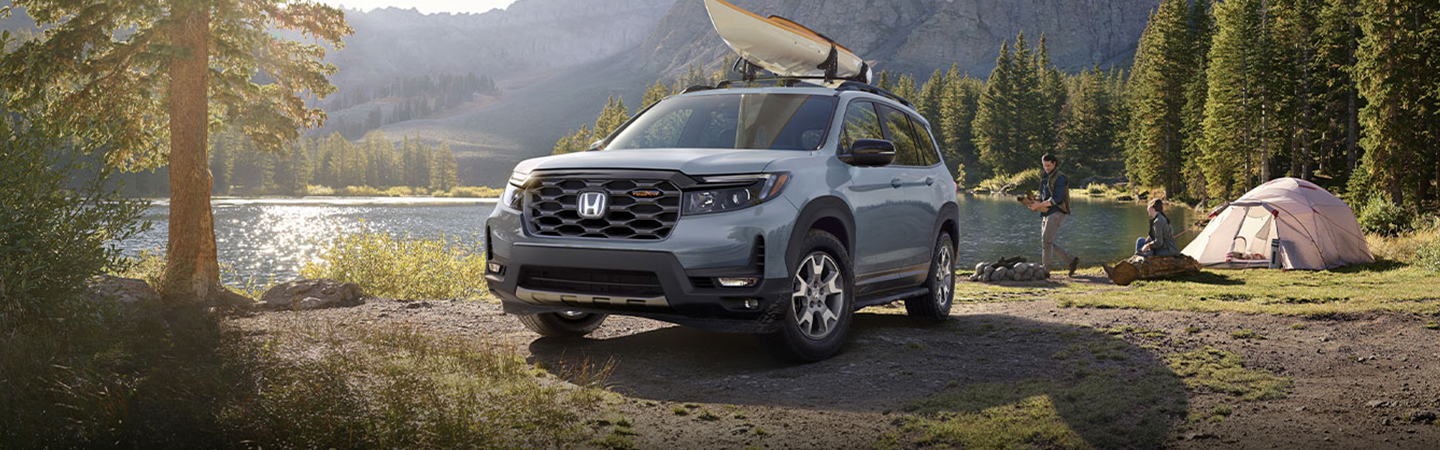 VW Atlas Cross Sport vs Honda Passport gray frontview