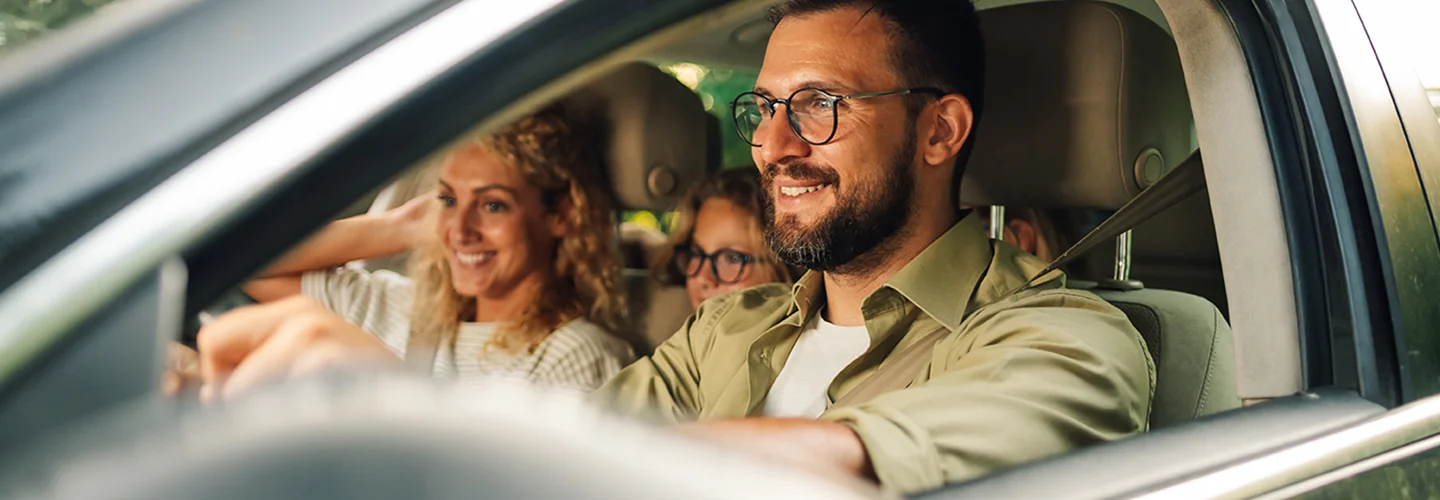 Close up of a family driving in a 2025 Volkswagen Taos