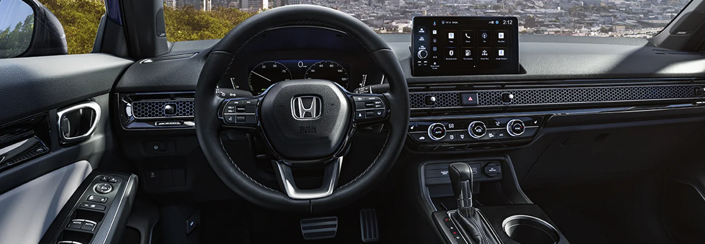 Interior view of the dashbaord and tech in a 2026 Honda Civic