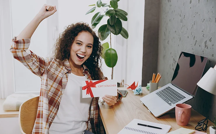 Person happy about there new gift card