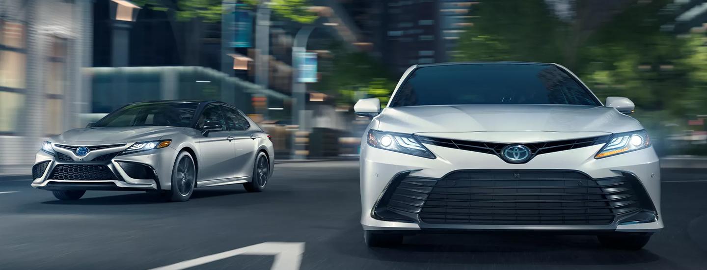 Driving 2021 Toyota Camry cars through the city