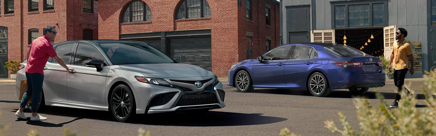 A Person opens the Toyota Camry front door