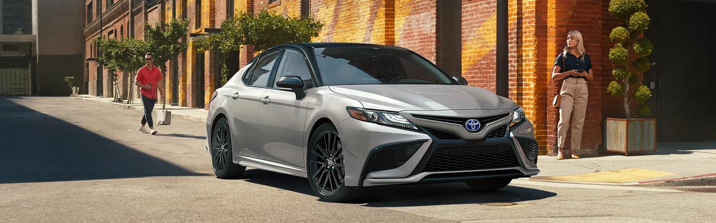 Toyota Camry is parked on the road side