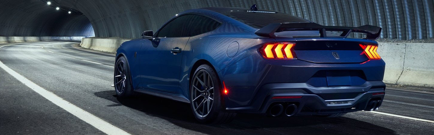 2024 Ford Mustang vs Dodge side back in blue Challenger