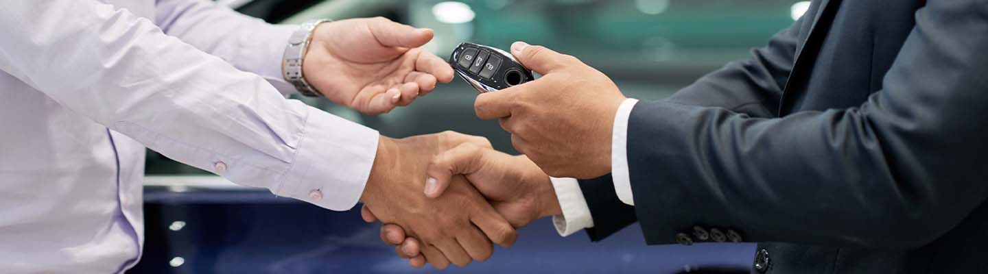 Dealer provides vehicle key to the buyer