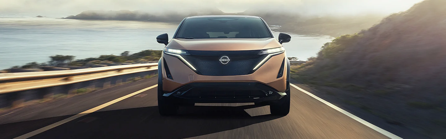 2024 Nissan ARIYA Specs brown color back side view 