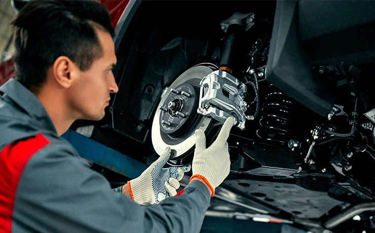 tech working under car