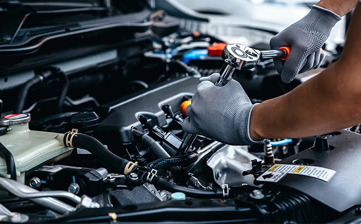 tech working on engine