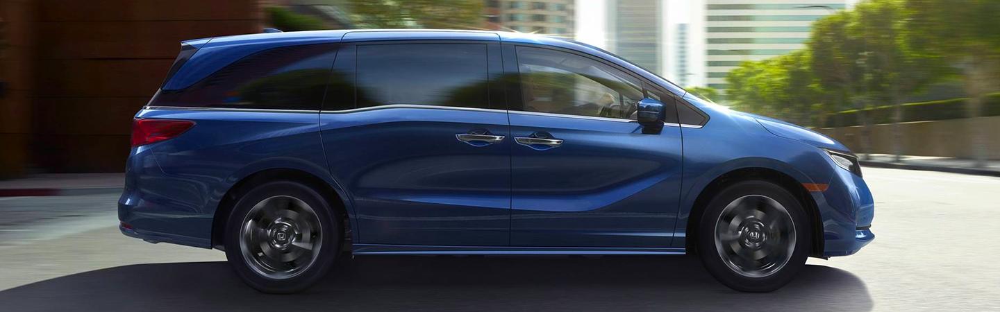 Blue 2021 Honda Odyssey in motion