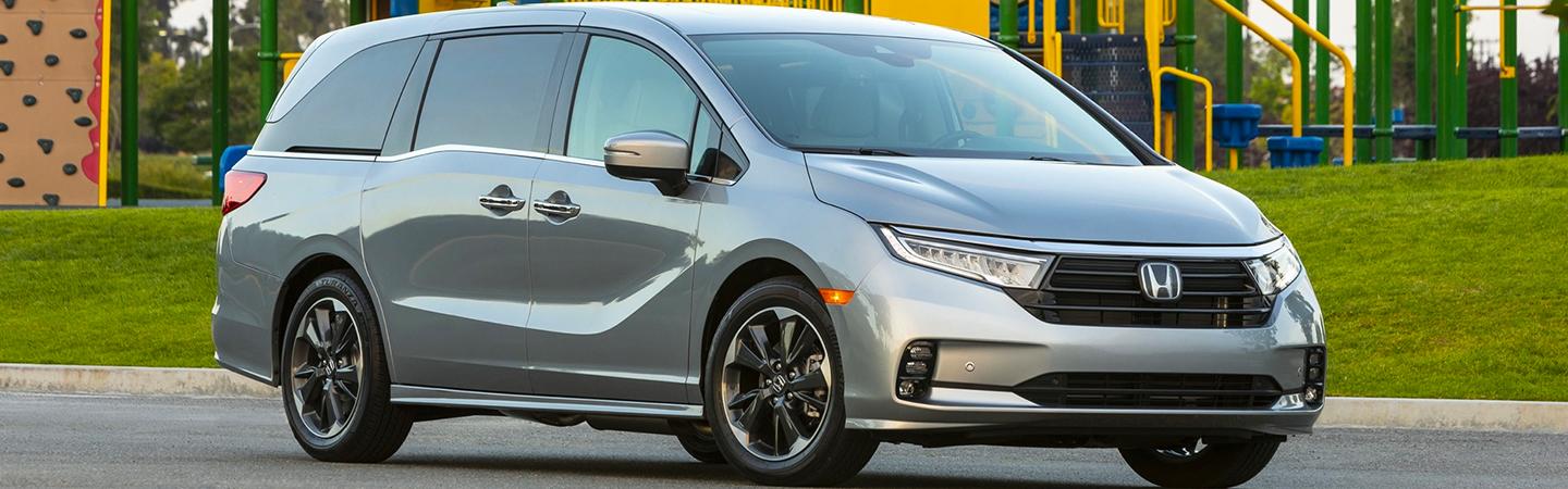 2021 Honda Odyssey parked next to a playground
