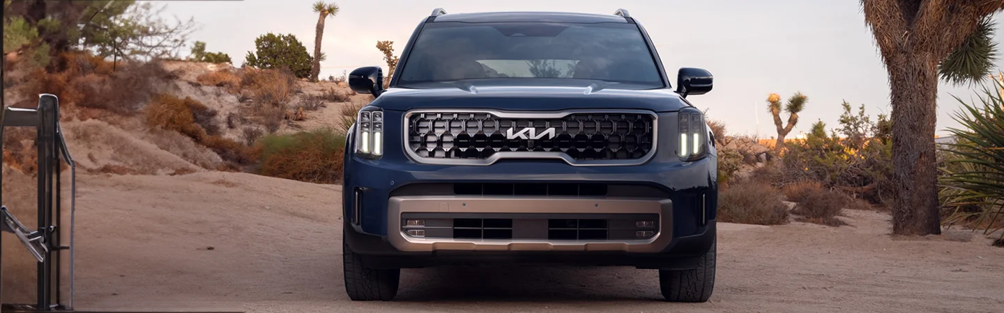 Comparison: 2024 Kia Telluride vs. Ford Explorer front side in black