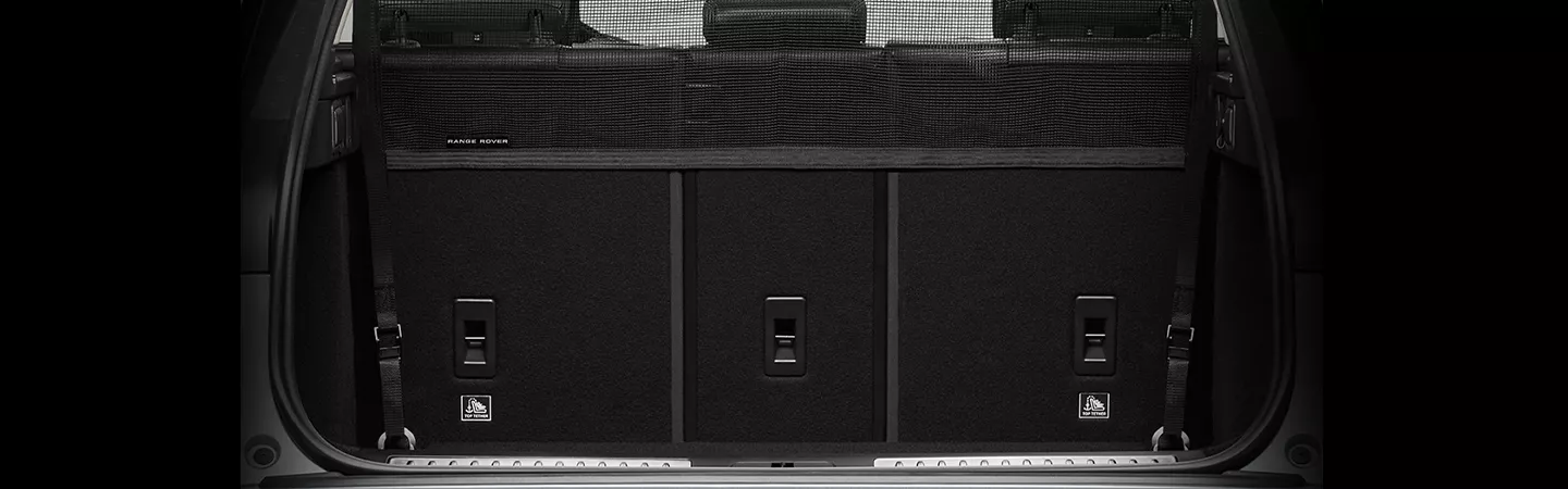 Rear view of a 2026 Range Rover Velar with the trunk open