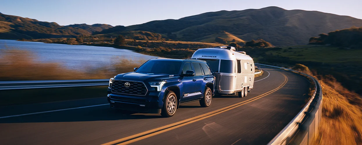 a 2026 Toyota SUV towing a camper with ease