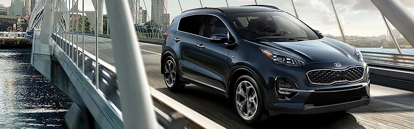 2022 Kia Sportage in motion left side view