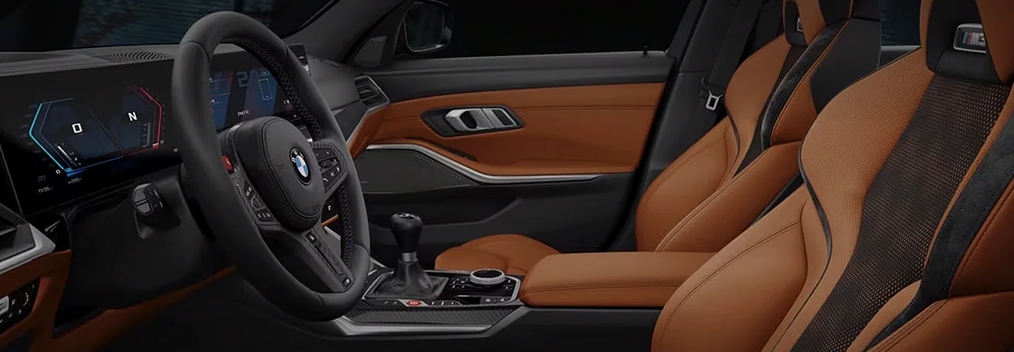 Interior view of the front seat of a 2024 BMW M3