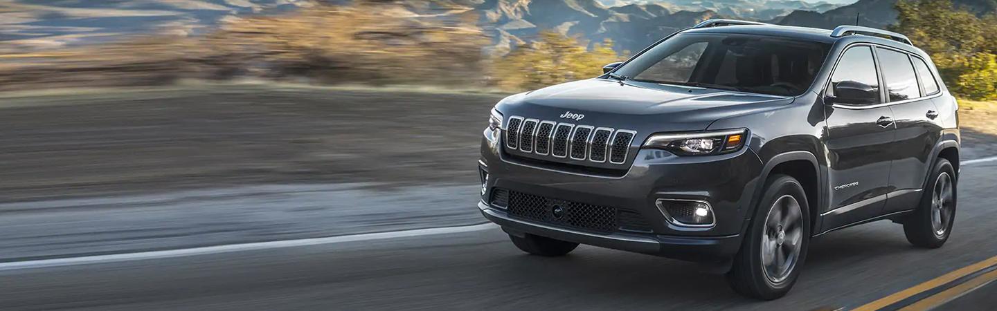 2021 Jeep Cherokee driving on the road