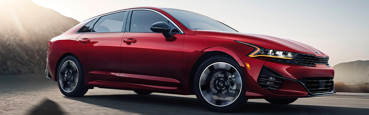 Angled view of the red 2021 Kia K5