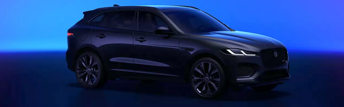 Side view of a parked 2025 Jaguar F-PACE in a studio