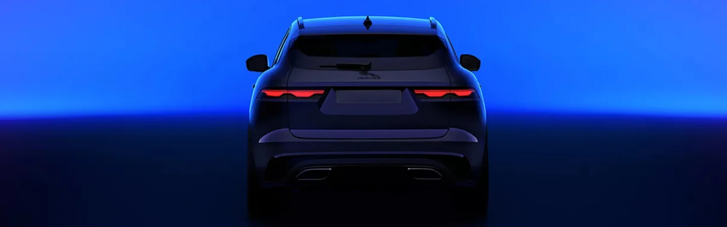 Back view of a parked 2025 Jaguar F-PACE in a studio