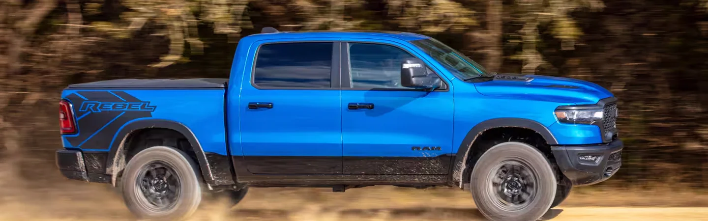 2025 RAM 1500 blue side view