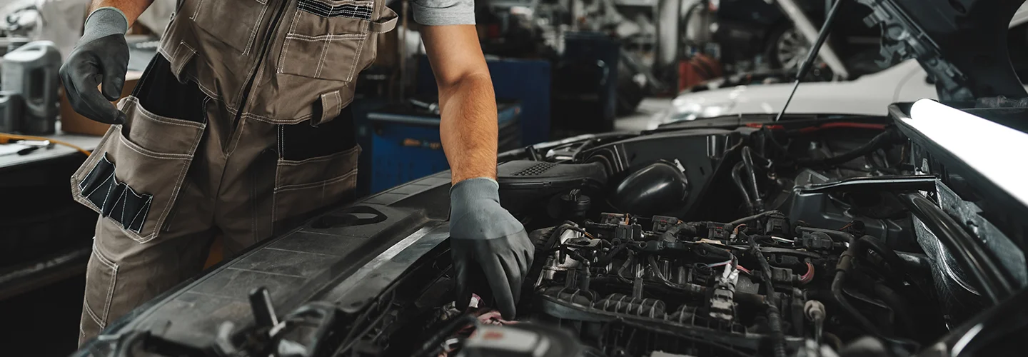 tech working on engine