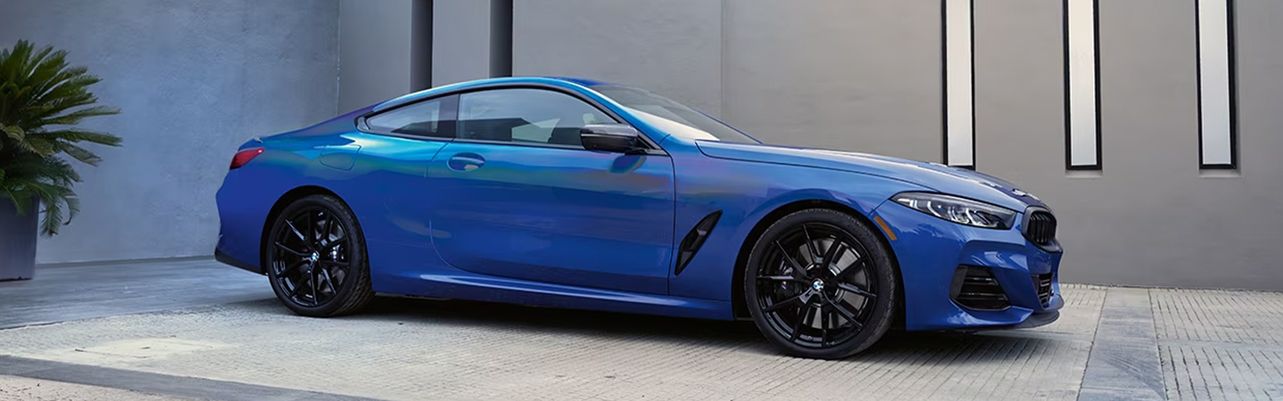 2024 BMW 8 Series Coupe blue color front sideview