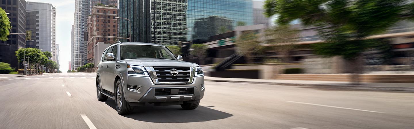 Gray 2021 Nissan Armada driving in the city