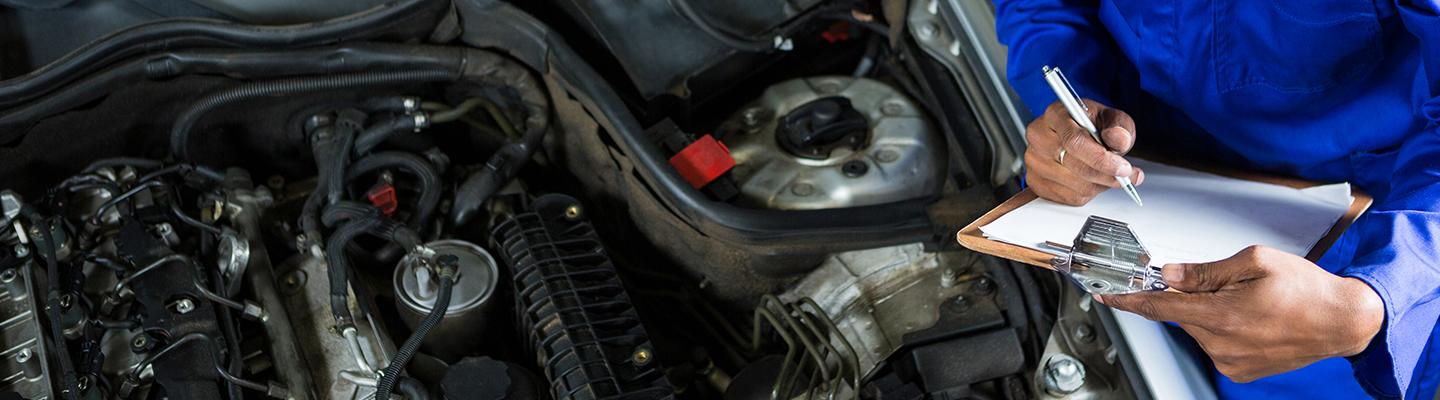 tech working on engine