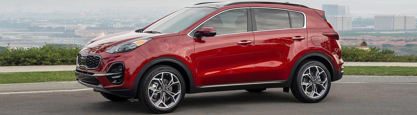 Red 2021 Kia Sportage parked