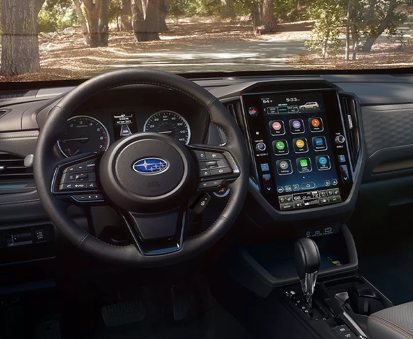 Interior view of the dashboard and tech of a Subaru Forester