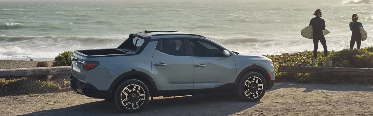 2025 Hyundai Santa Cruz Specs side front in blue 