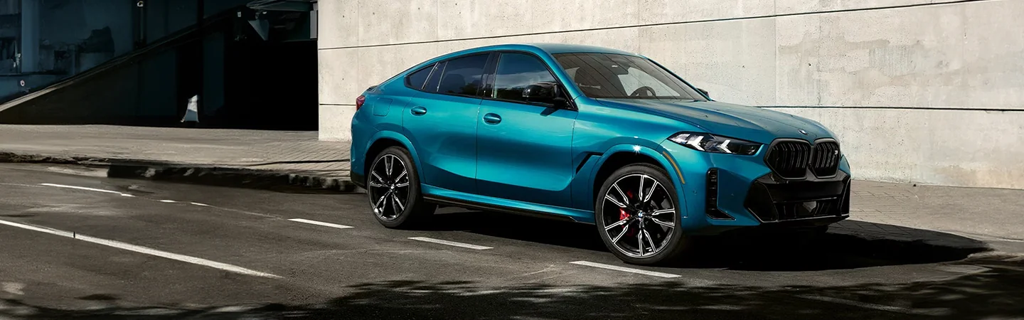 2025 BMW X6 Specs blue color and side view